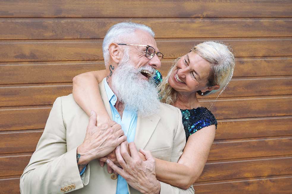 Mature elegant people laughing and having a tender moment together
